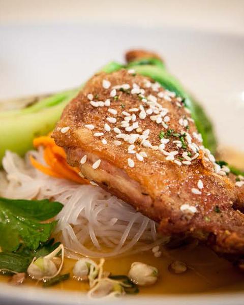 Seared duck with bok choy and rice noodles